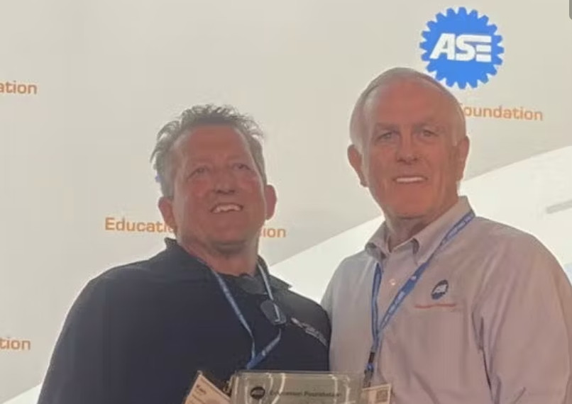 Ken Kunz (left) and Mike Coley, ASE Education Foundation president, at the ASE Instructor Training Conference in St. Louis.