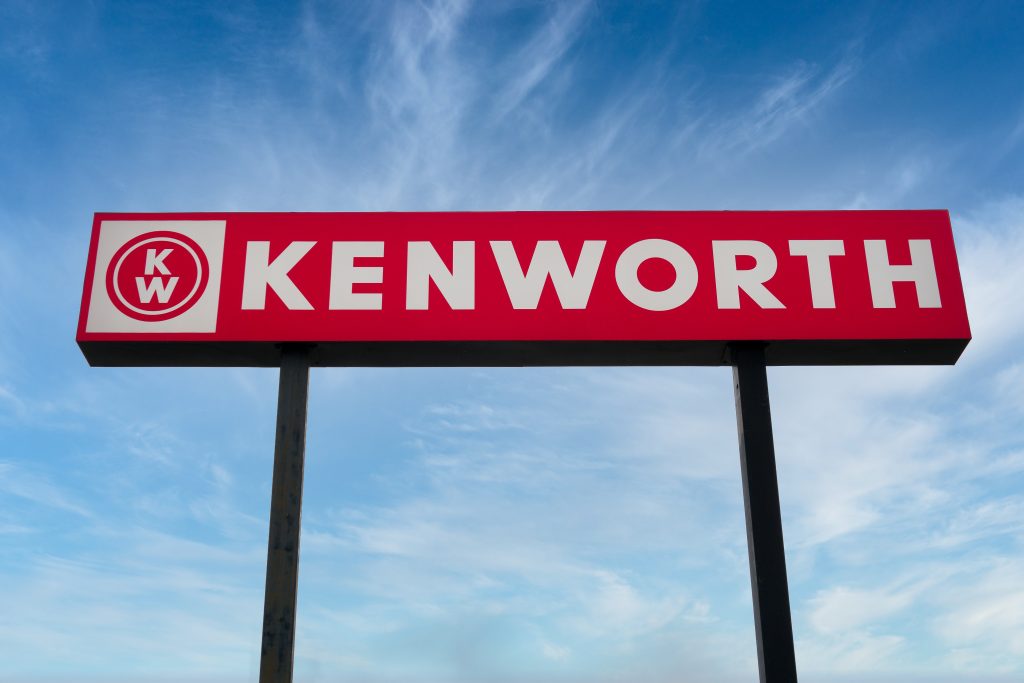 Tall red Kenworth sign