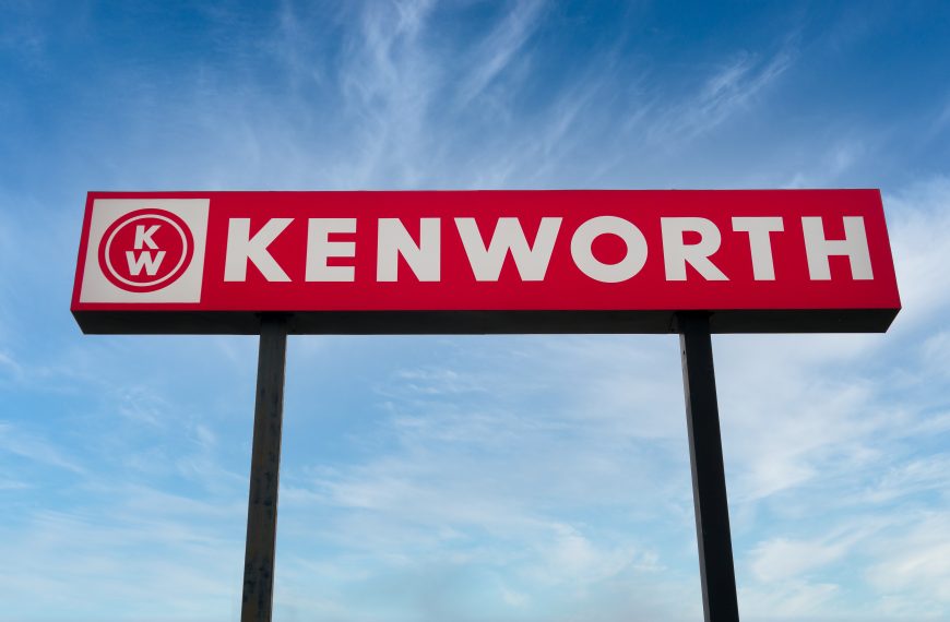 Tall red Kenworth sign