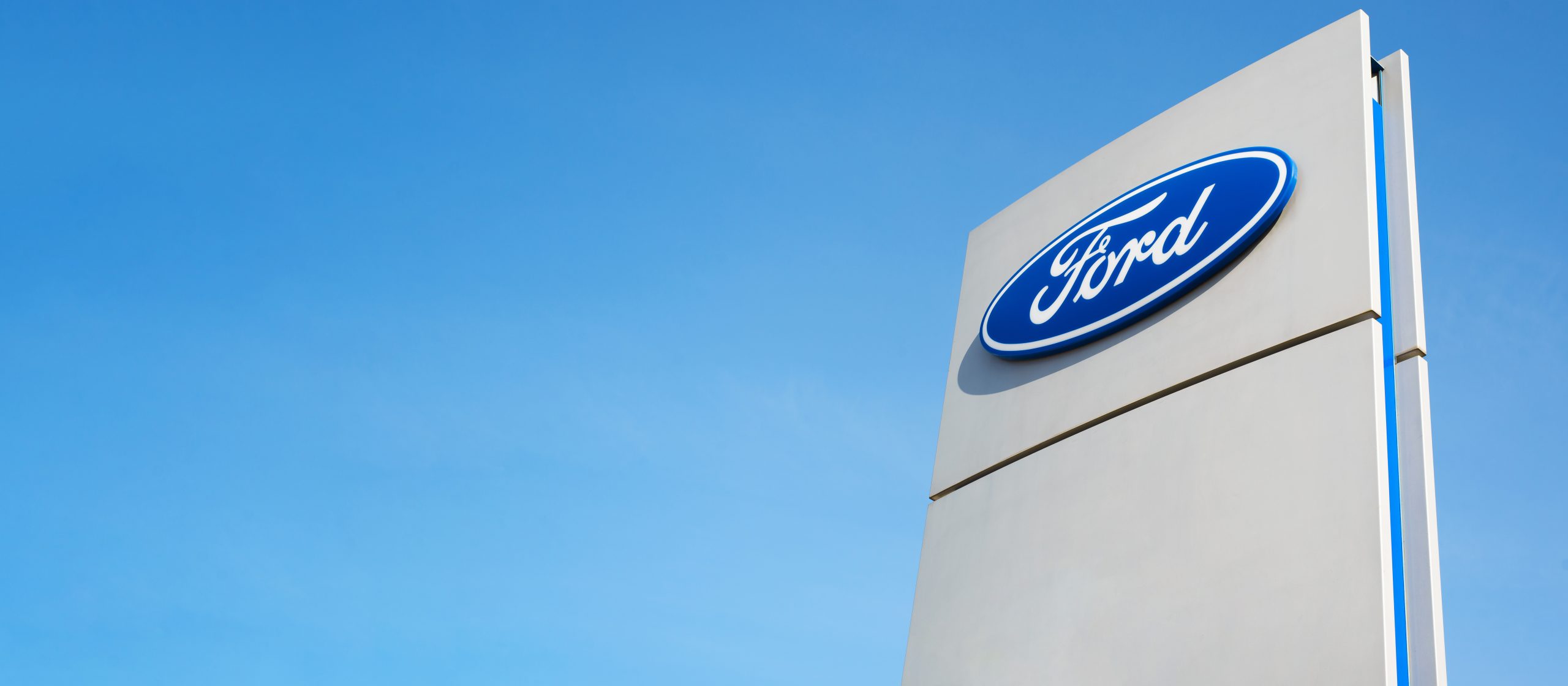 Ford sign against blue sky